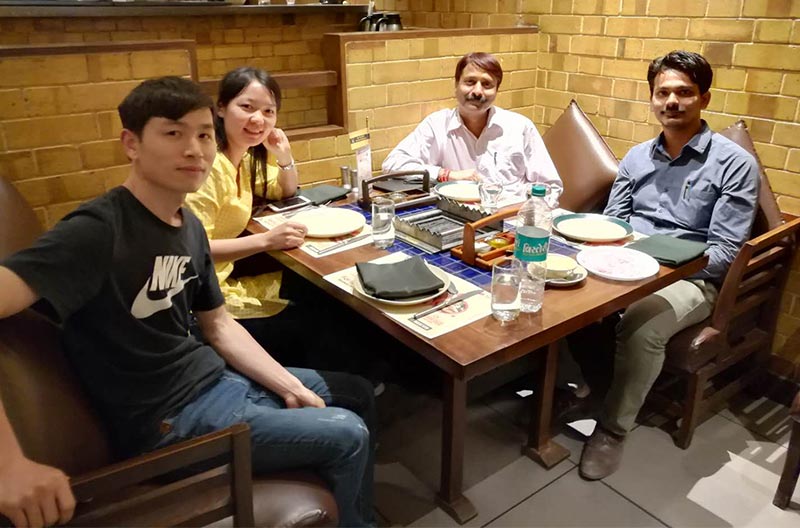 Dining with customers in New Delhi, India